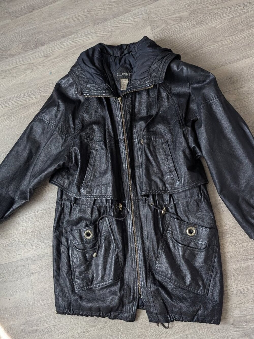 Comint brand black leather coat